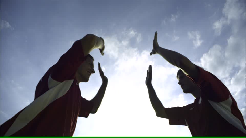 gimme-five-football-training-nonverbal-communication-embracing