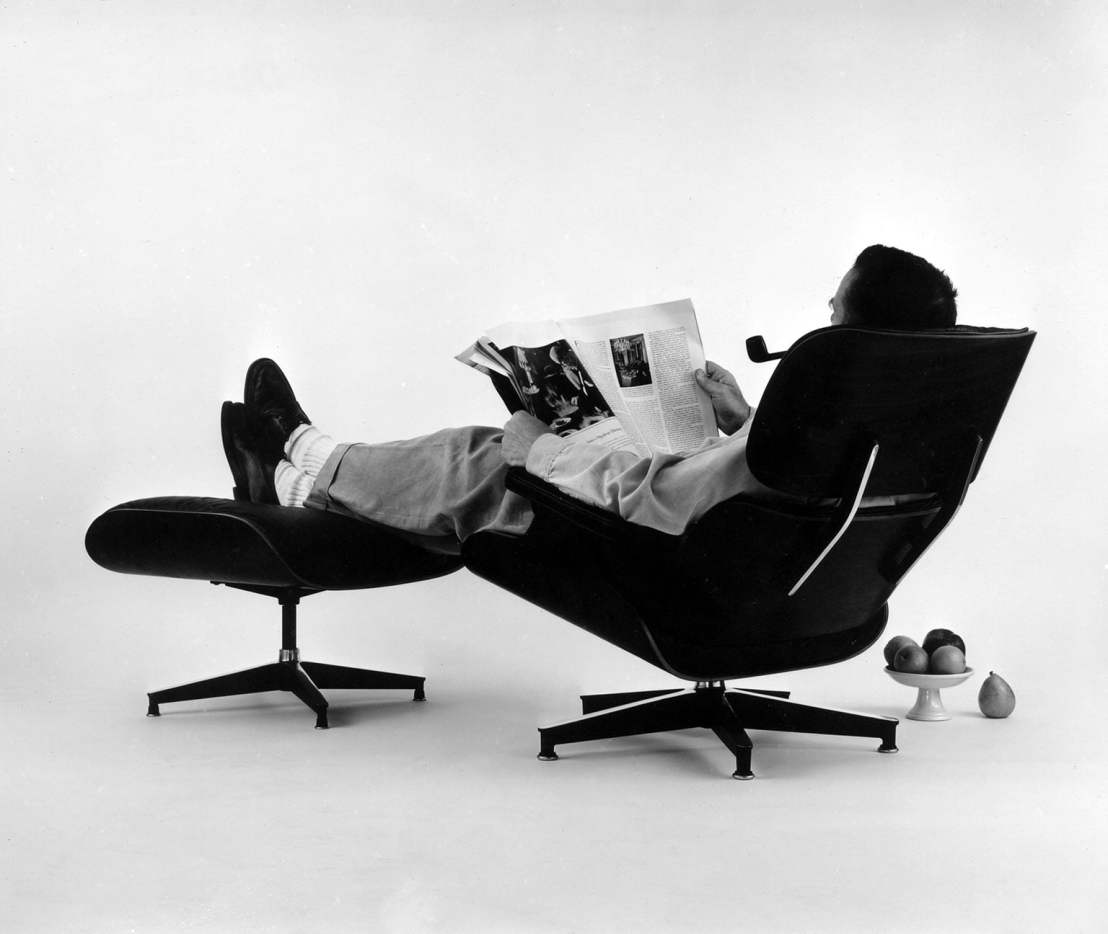 3-charles-eames-in-the-plywood-lounge-and-ottoman.-photograph-for-an-advertisement1956